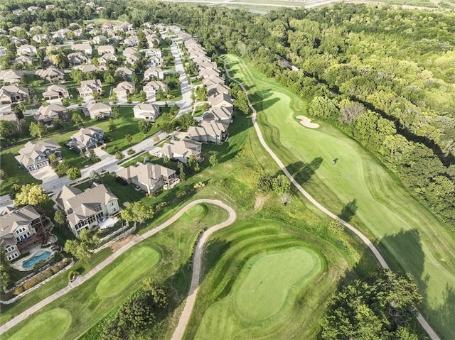 drone / aerial view featuring a residential view and view of golf course