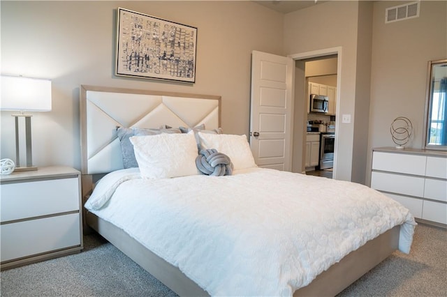 carpeted bedroom with visible vents