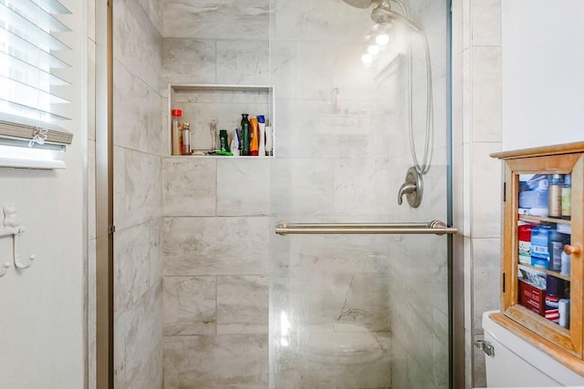 bathroom featuring a stall shower