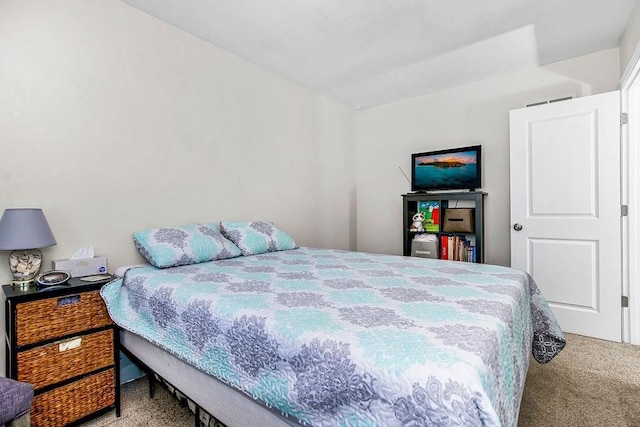 carpeted bedroom with visible vents