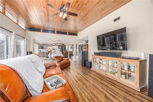 living area featuring wooden ceiling, decorative columns, wood finished floors, and ceiling fan