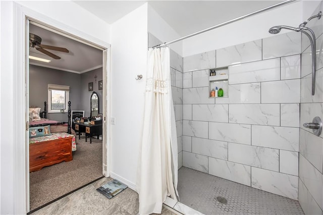 ensuite bathroom with crown molding, a ceiling fan, ensuite bathroom, and tiled shower