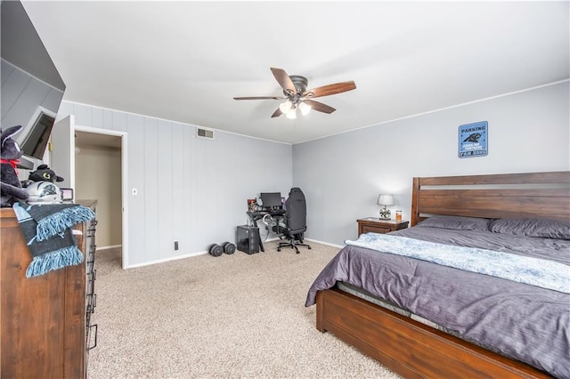 bedroom with visible vents, baseboards, carpet, and a ceiling fan