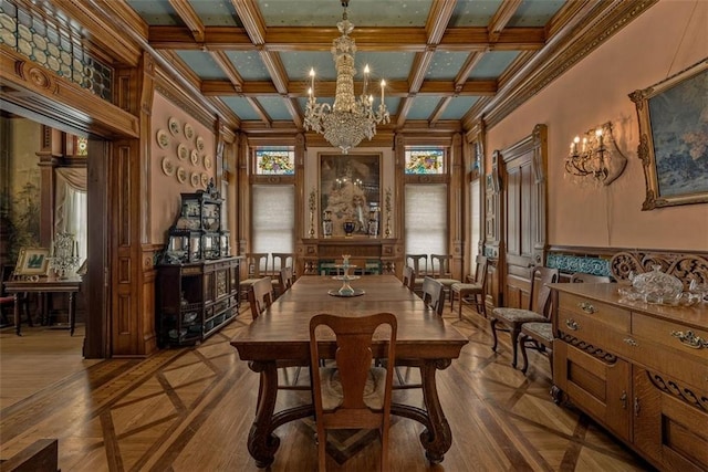 dining room featuring wainscoting, coffered ceiling, a notable chandelier, and beamed ceiling