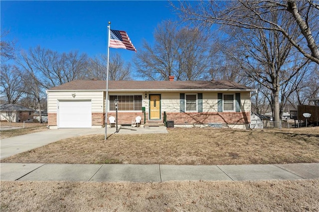 ranch-style house featuring a garage, driveway, brick siding, and entry steps