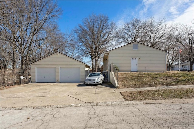 detached garage with fence