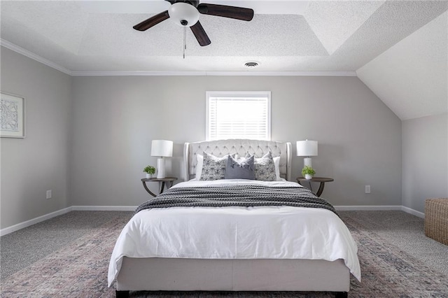 carpeted bedroom featuring a textured ceiling, ceiling fan, visible vents, baseboards, and vaulted ceiling