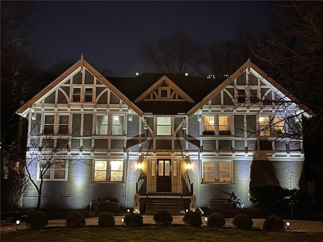 view of front of house featuring brick siding