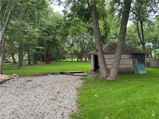 415 E Hale St, Spring Hill, KS 66083 - view of grassy yard featuring a shed