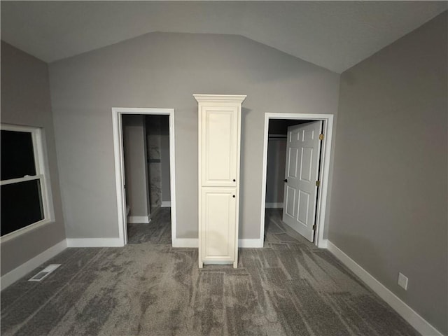 415 E Hale St, Spring Hill, KS 66083 - unfurnished bedroom featuring dark carpet and vaulted ceiling