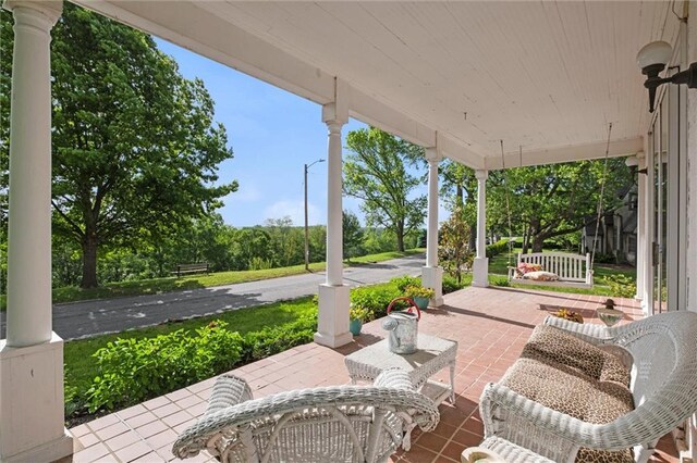 928 S Esplanade St, Leavenworth, KS 66048 - view of patio / terrace with a porch