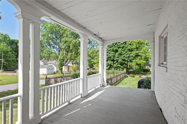 928 S Esplanade St, Leavenworth, KS 66048 - wooden deck featuring covered porch