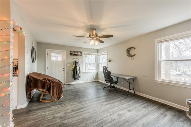 office area featuring ceiling fan, baseboards, and wood finished floors