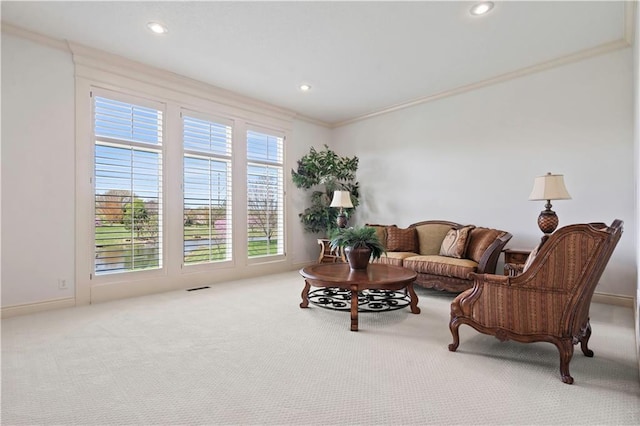 15300 Mastin St, Overland Park, KS 66221 - carpeted living area with crown molding, baseboards, visible vents, and recessed lighting