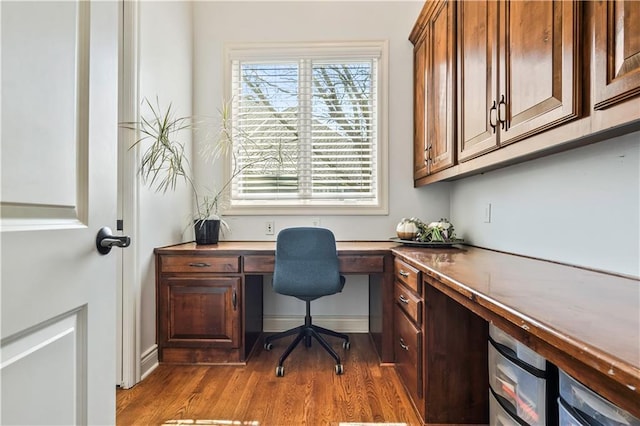 15300 Mastin St, Overland Park, KS 66221 - office space with built in desk, baseboards, and dark wood-type flooring