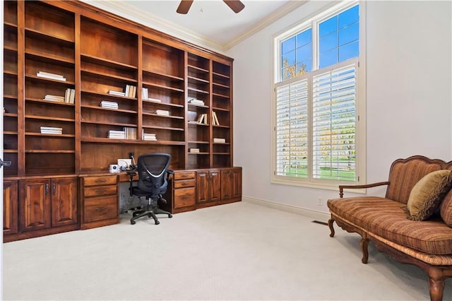 15300 Mastin St, Overland Park, KS 66221 - home office with baseboards, built in desk, ceiling fan, crown molding, and carpet flooring