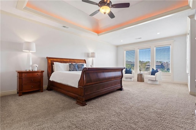 15300 Mastin St, Overland Park, KS 66221 - bedroom with visible vents, a tray ceiling, baseboards, and carpet floors