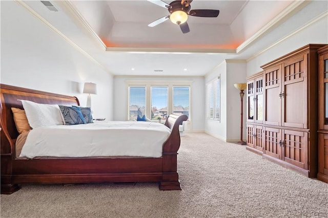 15300 Mastin St, Overland Park, KS 66221 - bedroom with visible vents, baseboards, ornamental molding, a tray ceiling, and carpet floors