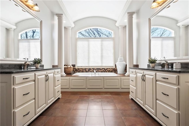 15300 Mastin St, Overland Park, KS 66221 - bathroom featuring ornate columns, a sink, and a wealth of natural light