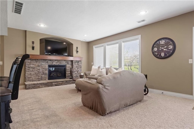 15300 Mastin St, Overland Park, KS 66221 - carpeted living room featuring visible vents, baseboards, recessed lighting, and a fireplace