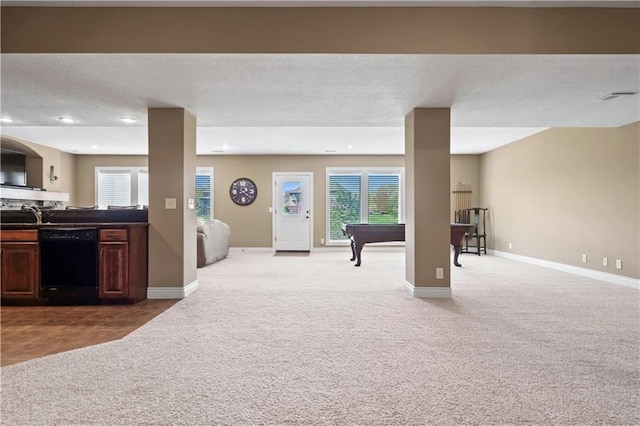 15300 Mastin St, Overland Park, KS 66221 - recreation room with baseboards, plenty of natural light, and carpet floors