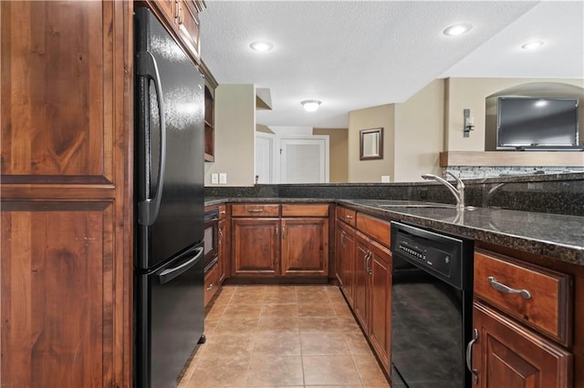 15300 Mastin St, Overland Park, KS 66221 - kitchen with dark stone countertops, light tile patterned floors, a sink, a textured ceiling, and black appliances