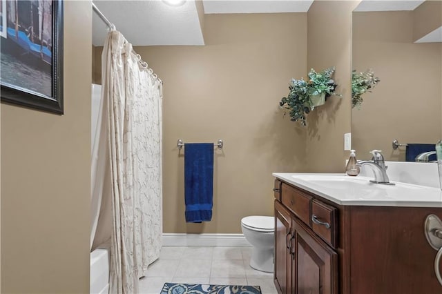 15300 Mastin St, Overland Park, KS 66221 - full bathroom with toilet, tile patterned floors, vanity, and baseboards