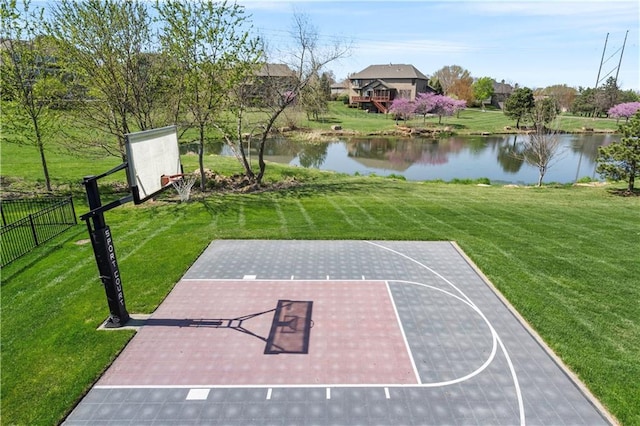 15300 Mastin St, Overland Park, KS 66221 - view of basketball court featuring a yard, fence, and basketball court