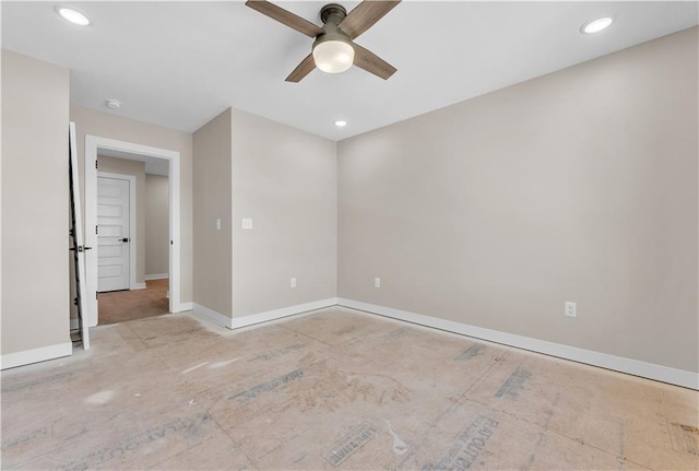 spare room with baseboards, a ceiling fan, and recessed lighting