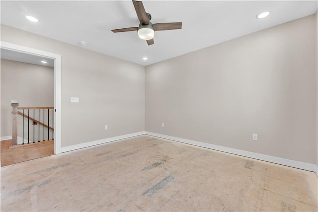 spare room with recessed lighting, ceiling fan, and baseboards