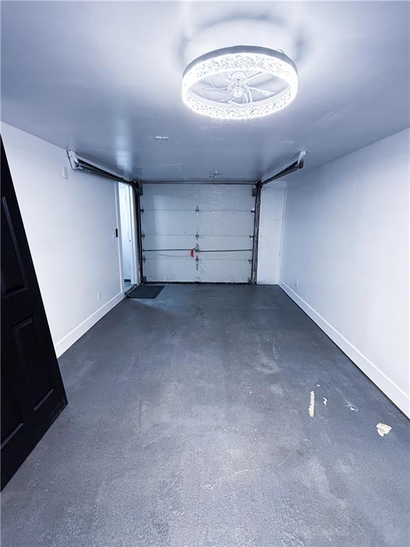 garage with baseboards