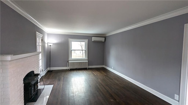 unfurnished living room with crown molding, dark wood finished floors, radiator heating unit, an AC wall unit, and baseboards