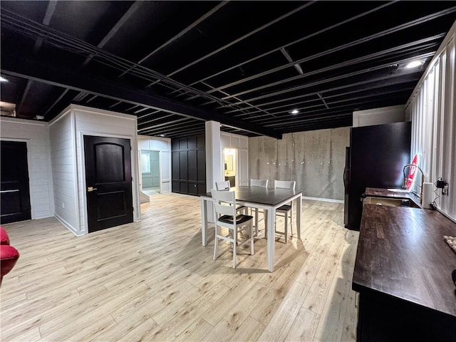 dining area with light wood-type flooring