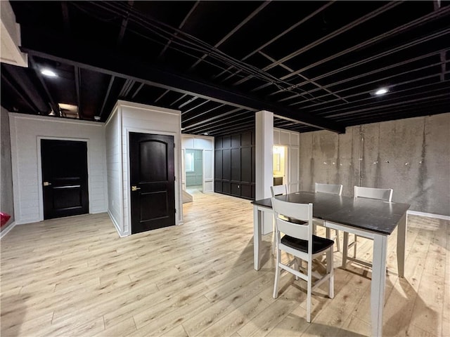 dining space featuring wood finished floors