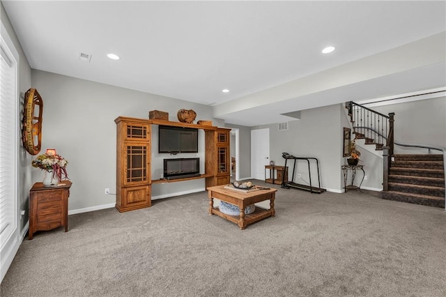 living area with recessed lighting, visible vents, baseboards, stairway, and carpet