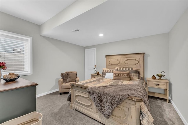 carpeted bedroom featuring recessed lighting, visible vents, and baseboards