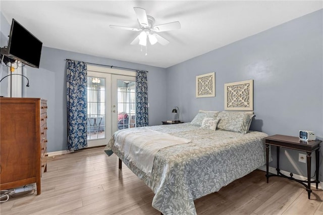 17259 174th St, Basehor, KS 66007 - bedroom with french doors, access to outside, wood finished floors, baseboards, and a ceiling fan