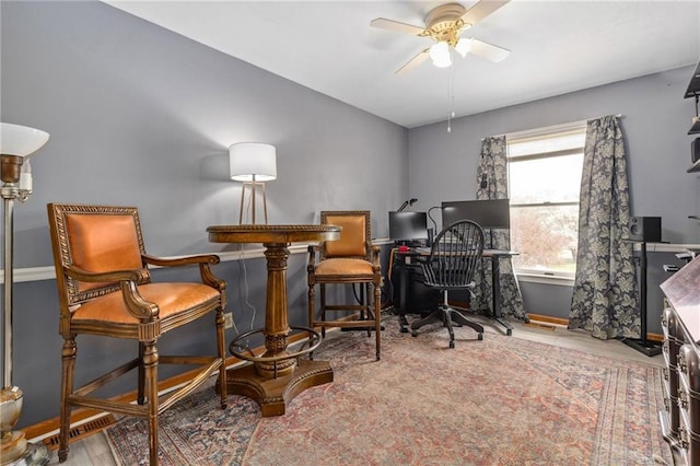 17259 174th St, Basehor, KS 66007 - sitting room with ceiling fan, baseboards, a desk, and wood finished floors