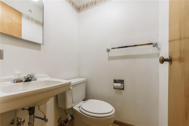 half bathroom with toilet