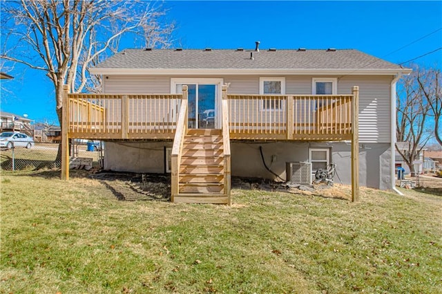 rear view of house featuring stairs, a lawn, and cooling unit