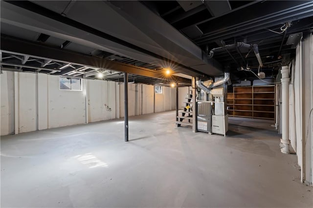 basement featuring heating unit