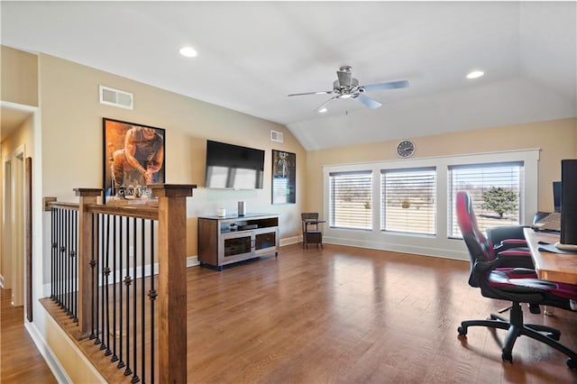 home office with visible vents, vaulted ceiling, wood finished floors, and recessed lighting