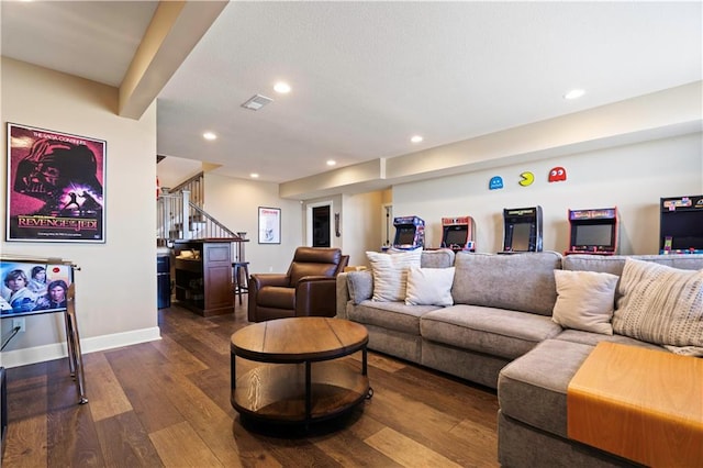 living room featuring dark wood finished floors, recessed lighting, visible vents, stairway, and baseboards