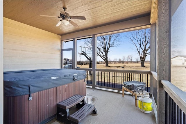 exterior space featuring a hot tub and ceiling fan