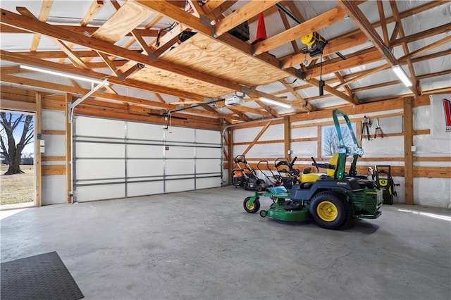 garage featuring a garage door opener