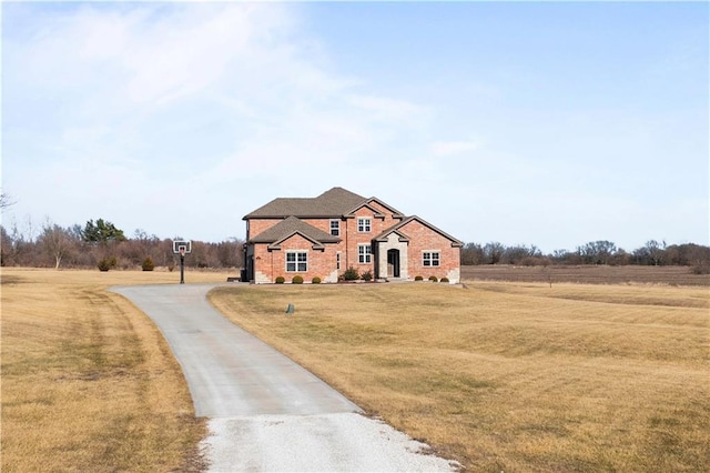 view of front of property with a front lawn