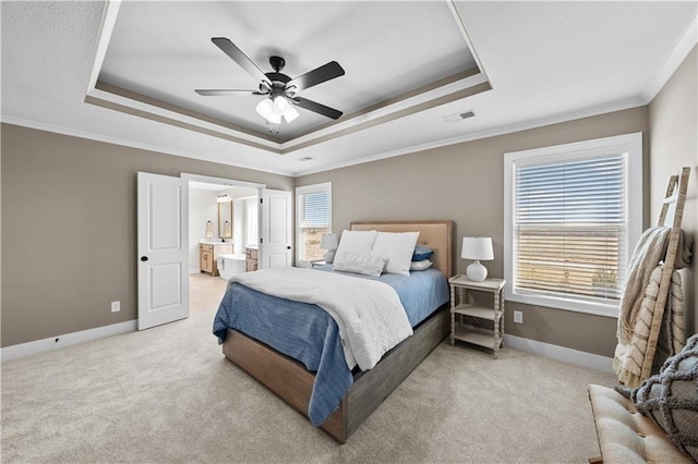 16967 S Hunter St, Olathe, KS 66062 - bedroom featuring baseboards, a tray ceiling, and light colored carpet