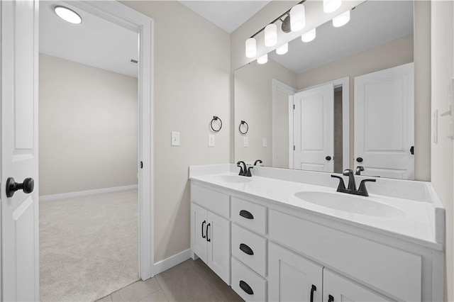 16967 S Hunter St, Olathe, KS 66062 - full bath with tile patterned flooring, a sink, baseboards, and double vanity