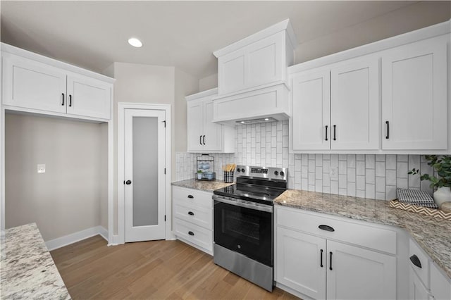 16967 S Hunter St, Olathe, KS 66062 - kitchen featuring baseboards, white cabinets, decorative backsplash, stainless steel electric range oven, and light wood finished floors
