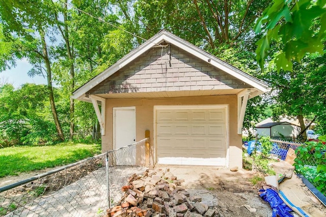 detached garage with fence